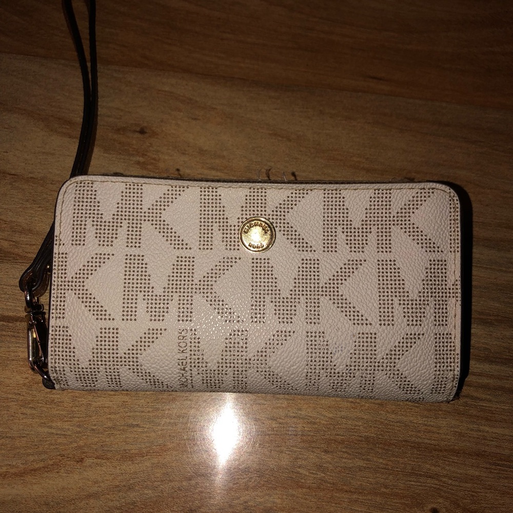 Michael Kors Wristlet/cell phone holder/wallet